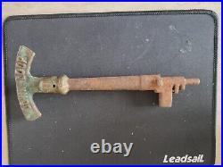 A Very Rare Large brass and metal down loop Key