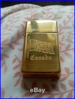 Solid Brass Zippo Canada slimline new very rare still sealed