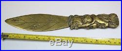 VERY RARE old brass baby putto puttini on Tritón fish swiming letter opener