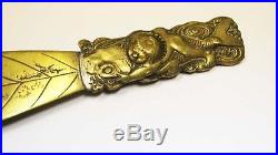 VERY RARE old brass baby putto puttini on Tritón fish swiming letter opener