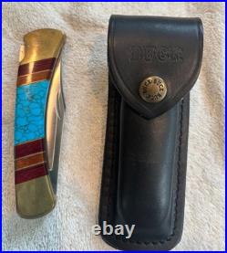 Very Rare Buck 110, Inverted U, Turquoise and Wood Inlay and Brass Custom Knife
