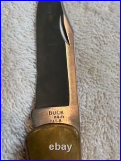 Very Rare Buck 110, Inverted U, Turquoise and Wood Inlay and Brass Custom Knife