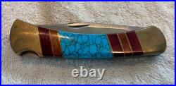Very Rare Buck 110, Inverted U, Turquoise and Wood Inlay and Brass Custom Knife