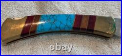 Very Rare Buck 110, Inverted U, Turquoise and Wood Inlay and Brass Custom Knife