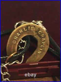 Very Rare Charlie Chaplin horseshoe pendant From His 1915 Movie The Boxer
