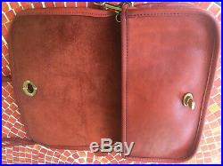 Very Rare Original NYC Dinky Vintage Coach Shoulder Bag in Oxblood Red. 1970s