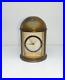 Very-rare-Vintage-Europa-8-Day-brass-Table-Clock-With-Closing-Doors-and-Dome-01-tcv